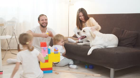Careful Parents Looking After Children at Home alt