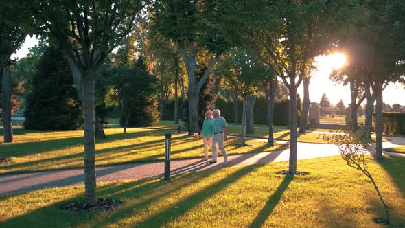 Elderly Couple Walking in Slow-mo. alt