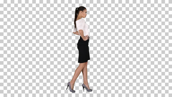 Beautiful Young Woman in Elegant Outfit Walking Holding alt