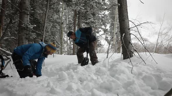 Digging A Snow Shelter alt