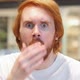 Wondering Redhead Man at Work Hiding Eyes in Shock - VideoHive Item for Sale