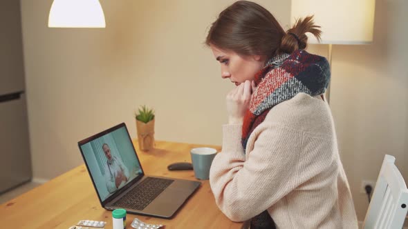 Woman in Selfisolation Communicates with a Doctor By Video Call Using a Laptop a Patient Consults a alt
