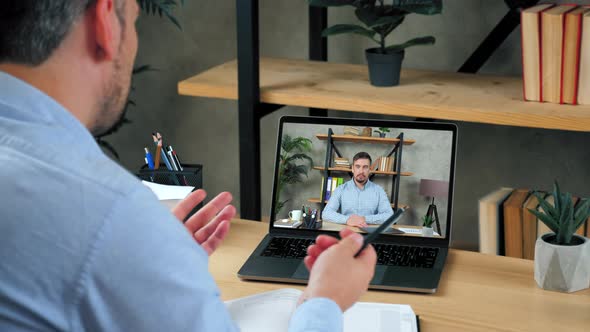Businessman at Home Office Tells Manager Online Video Call Webcam Chat Laptop alt