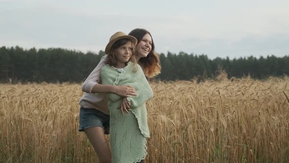 Loving Family, Older Sister Caring, Playing, Looking with Younger Girl alt