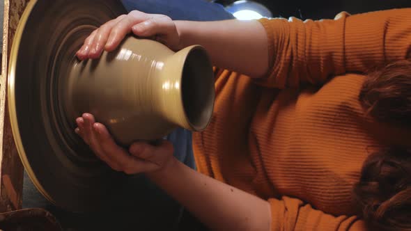 Woman Makes Jug of Clay in Pottery Workshop Smiles Happy Beautiful Footage Background Authentic