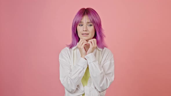 Young Woman Looks Anxious Waiting for Results Closeup alt