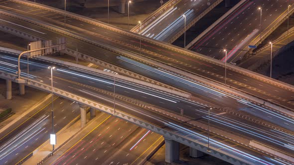 Top View City Traffic on a Big Crossroad in Business Bay Night Timelapse alt