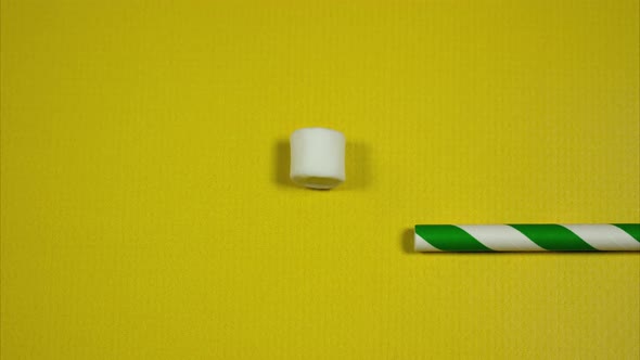 Marshmallow Bubbles are Blown Out of a Paper Straw. Stop Motion alt