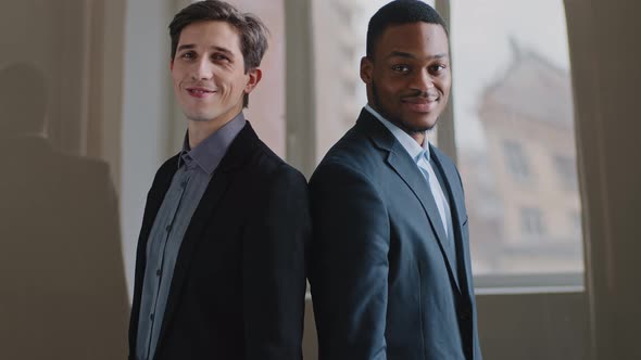 Two Male Multiethnic Partners Multiracial Colleagues Businessmen Caucasian Manager Boss and African alt