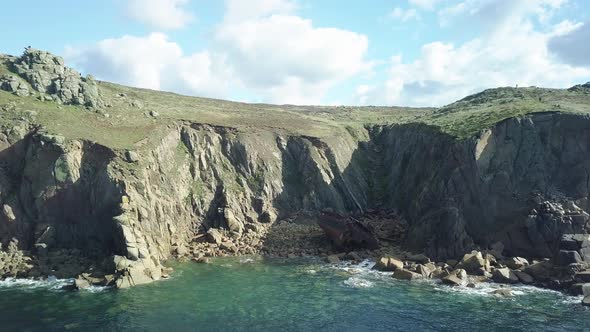 Beautiful Island View In Land's End United Kingdom Featuring RMS Mulheim Shipwreck - panning aerial alt