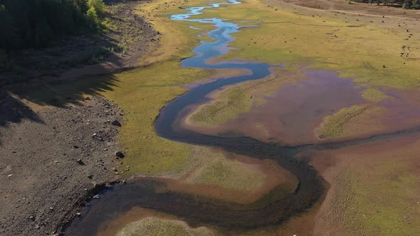Almost completely dried out Clear Lake in Oregon during a hot summer day. alt