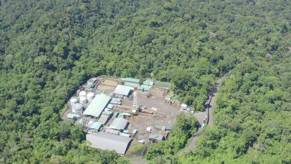 Top view of an oil pumping platform in the Amazon rainforest alt