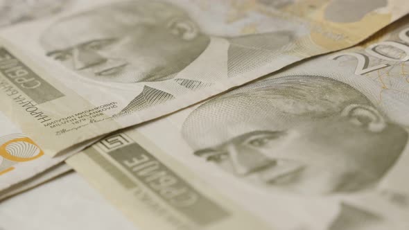 Currency dinar in 2000 denominations on pile slow pan  4K 2160p 30fps UltraHD footage - Offical bank alt