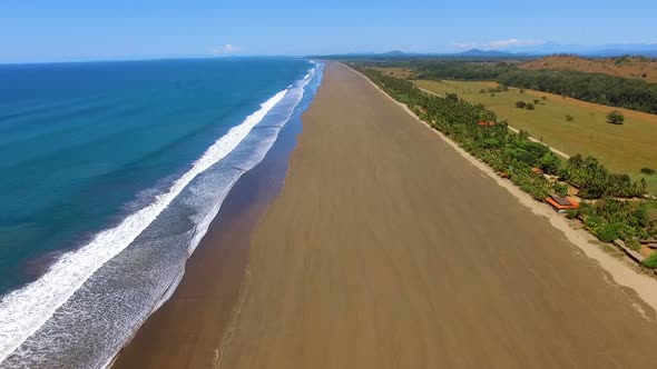 Tropical infinite sandy beach aerial drone view