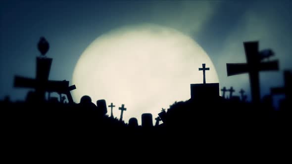 Scary Cemetery and Ravens on a Spooky Night with Full Moon alt