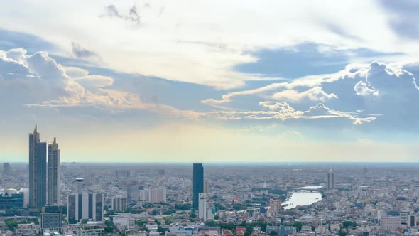 Bangkok business district city center and River, with dramatic cloud and sky - Time Lapse