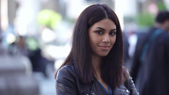  Charming young asian  Woman Smiling And Talking On The Phone On  Street alt