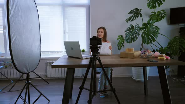Young Beautiful Woman Leads Her Video Blog From Home