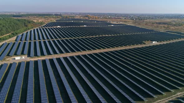 Aerial Drone Footage. Flight Over Solar Panel Farm. Renewable Green Alternative Energy