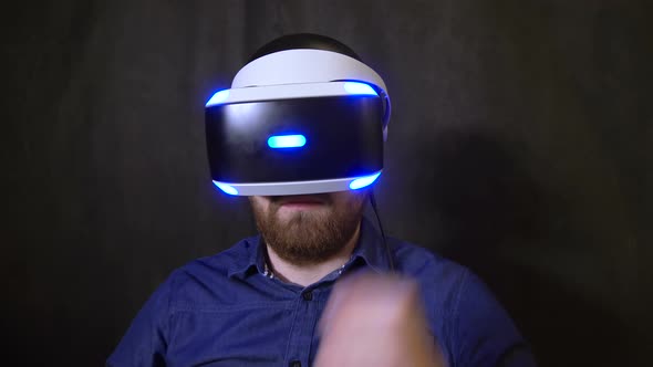 Person Wears Virtual Reality Glasses Closeup Look Digital World, Raises Head