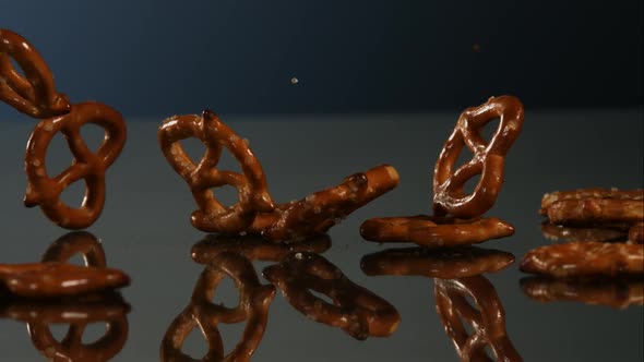 Pretzels falling and bouncing in ultra slow mo alt