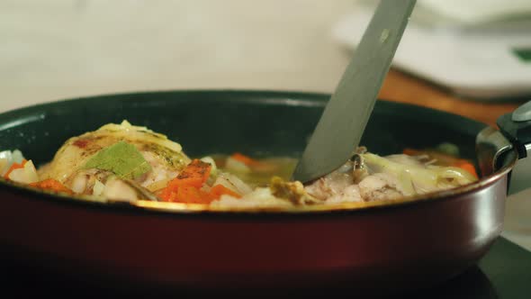 Flipping Stewing Chicken Thighs alt