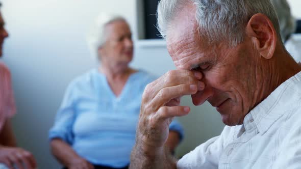 Doctor and seniors interacting with each other 4k alt