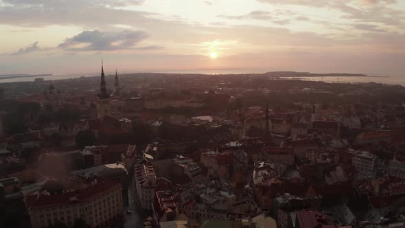 Beautiful Aerial Drone Shot of Old Town of Tallinn Estonia at Sunset alt