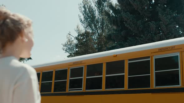 Woman Waving Smiling African American Schoolgirl alt