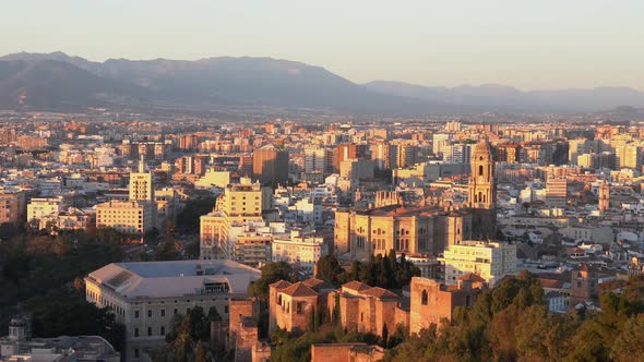 City and hills at sunset, Malaga, Spain