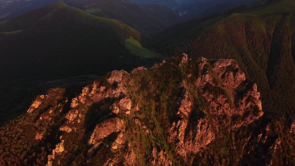 Cinematic Aerial Video of the Golden Hour on Top of a Mountain in a National Park at Sunrise
