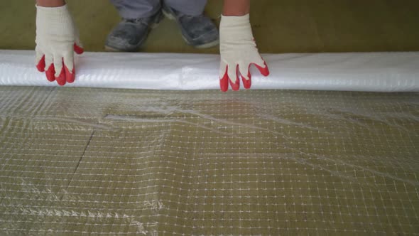 Laying the Film on the Floor alt