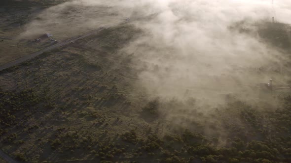 Aerial view a valley with fog on Madeira Island, Portugal. alt