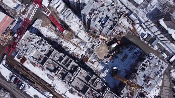 Aerial view of construction site in winter season.