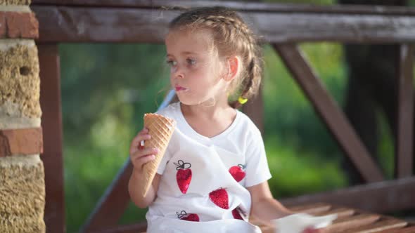 Little Girl Eat Ice Cream Outdoor alt