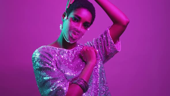 Pandemic Fashion Neon Glamour Woman in Face Mask alt