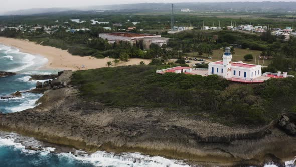 Aerial View Of Arecibo Lighthouse And Idyllic Beach Of La Poza del Obispo In Arecibo, Puerto Rico - alt