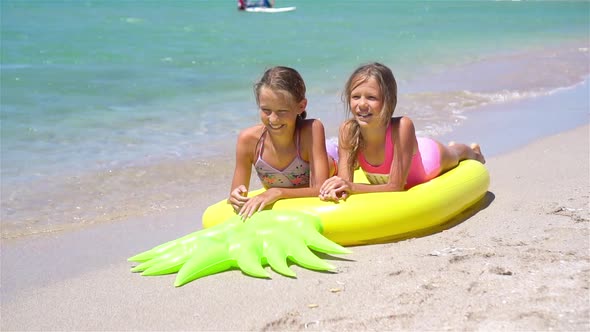 Little Girls Having Fun at Tropical Beach During Summer Vacation Playing Together, Stock Footage 