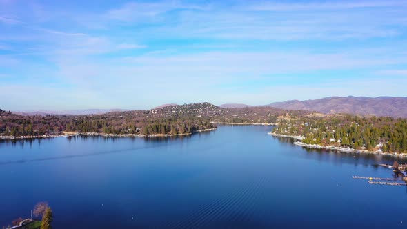 Lake Arrowhead aerial view with drone in 4k panning left. alt