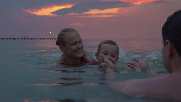 Happy Family Bathing in the Dusk alt