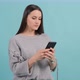 Close Up of a Woman Using Smartphone. Girl Texting To Her Boyfriend on Her Phone. - VideoHive Item for Sale