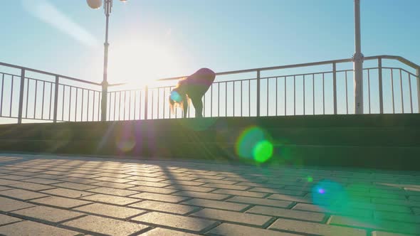 Yoga and Pilates Exercises on the Roof alt