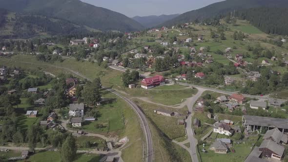Aerial To Vorokhta Village in Carpathians Mountains, Ukraine alt
