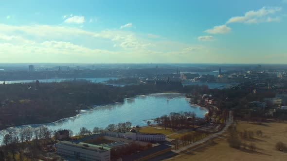 HIGH ANGLE TIMELAPSE STATIC of Stockholm and surroundings on a sunny day alt
