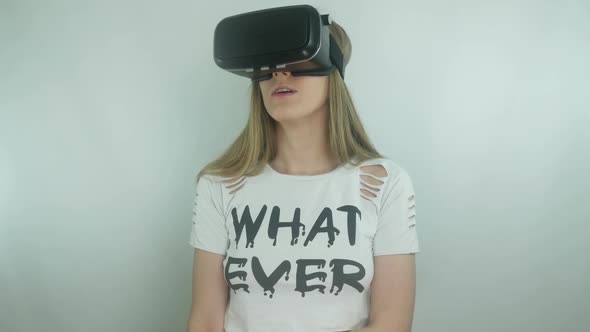 Young Sexy Girl Using Modern Helmet Virtual Reality