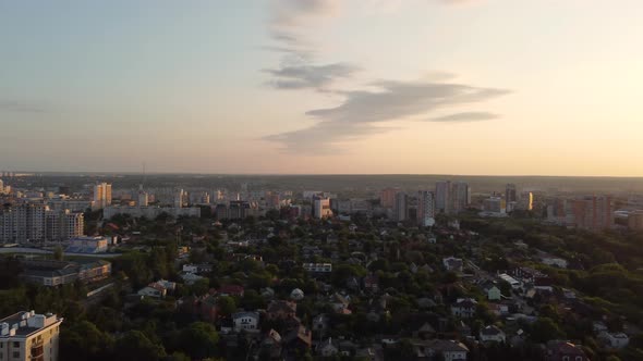 Green city park aerial near residential buildings