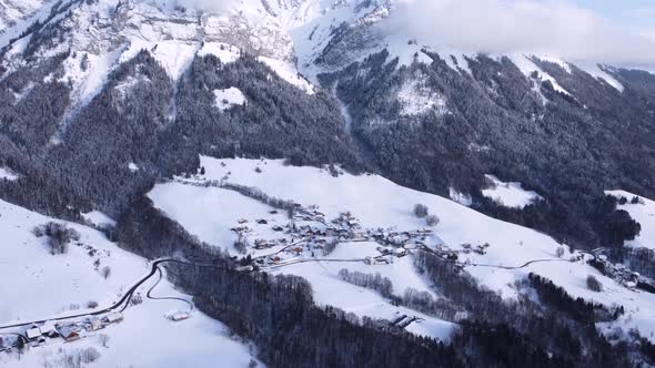 Drone Shot Over a Small Mountain Town in Alpes France