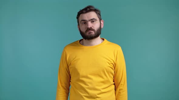 Indifferent Unsure Man Makes Gesture of I Dont Know Cant Help Anything alt