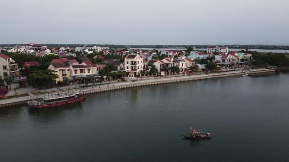 Aerial View of Peaceful Hoi An Town in Vietnam and the Historical Thu Bon River alt
