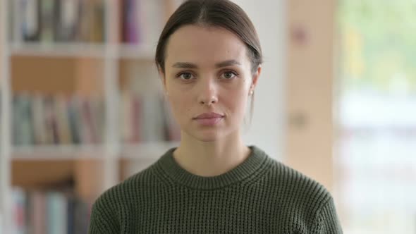Young Woman Looking at the Camera alt